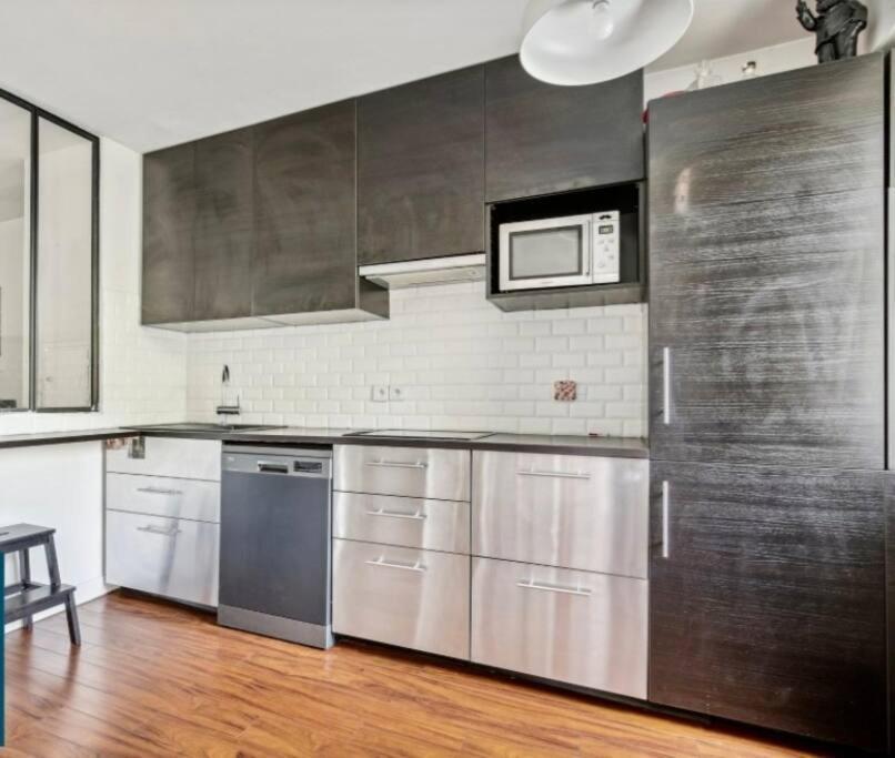 Paris : Appartement Familial Avec Parking Prive Clichy Esterno foto